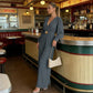 🔗 Elegáns V-nyakú, széles szárú jumpsuit övvel