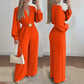 🔗 Elegáns V-nyakú, széles szárú jumpsuit övvel