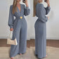 🔗 Elegáns V-nyakú, széles szárú jumpsuit övvel
