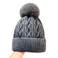 🧢 Uniszex téli kötött sapka pomponnal