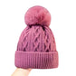 🧢 Uniszex téli kötött sapka pomponnal